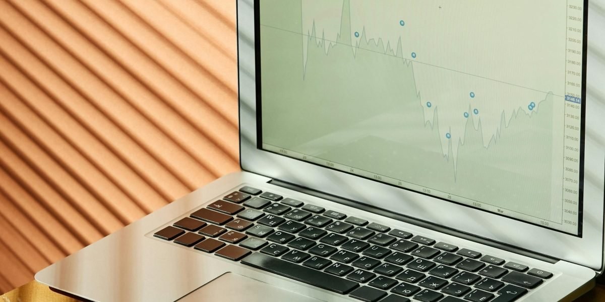 Notes and commission chart on a laptop screen
